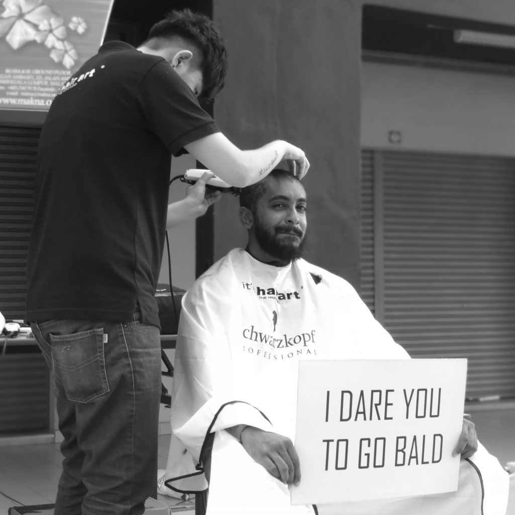 The picture was taken during our last event, Jom Botak Campaign, which was held to show our support to Cancer patients. UNITEN's students,lecturers and also public had contributed in the donation and some also went bald for the cause (even girls!).
